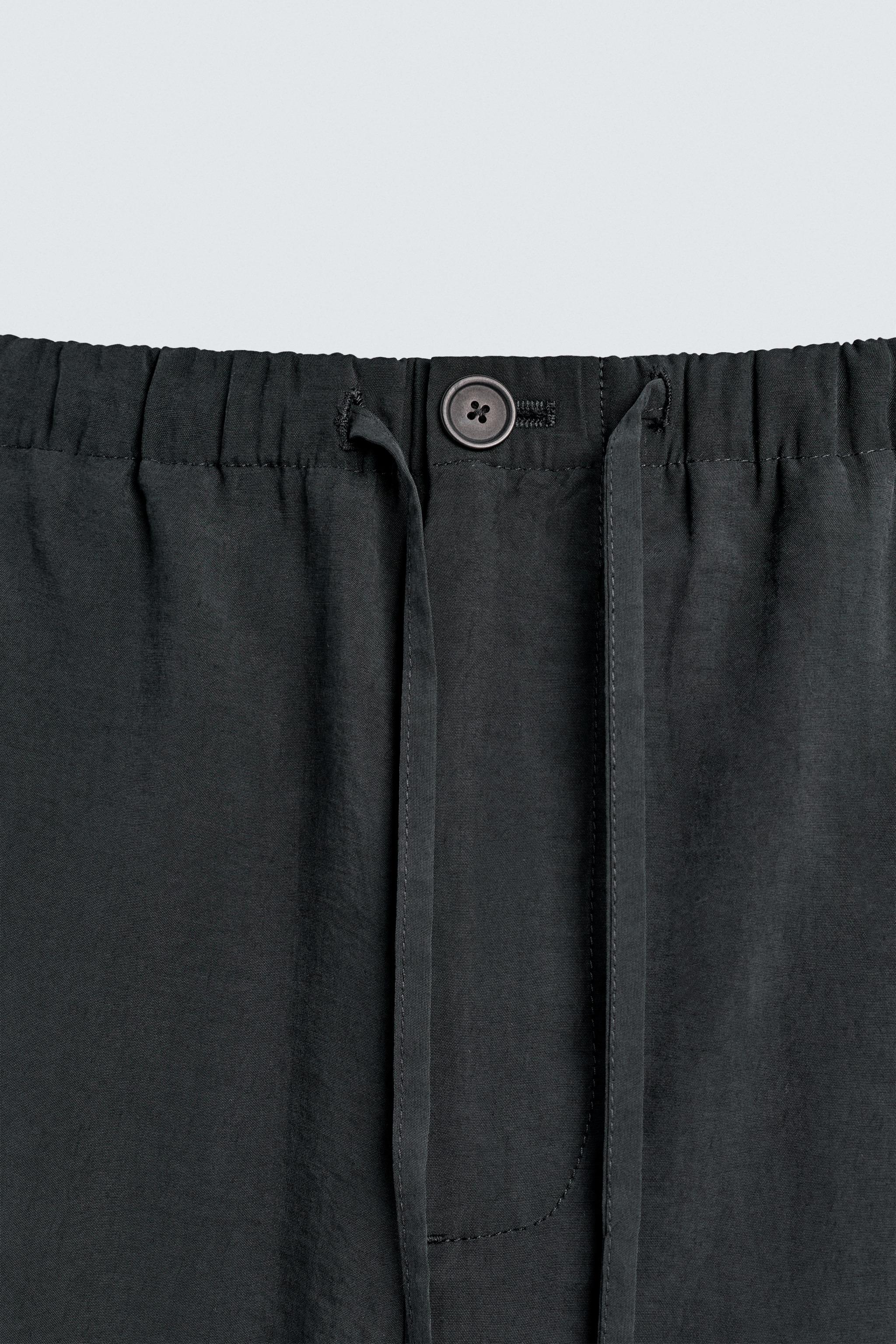 RELAXED FIT FLOWY PANTS